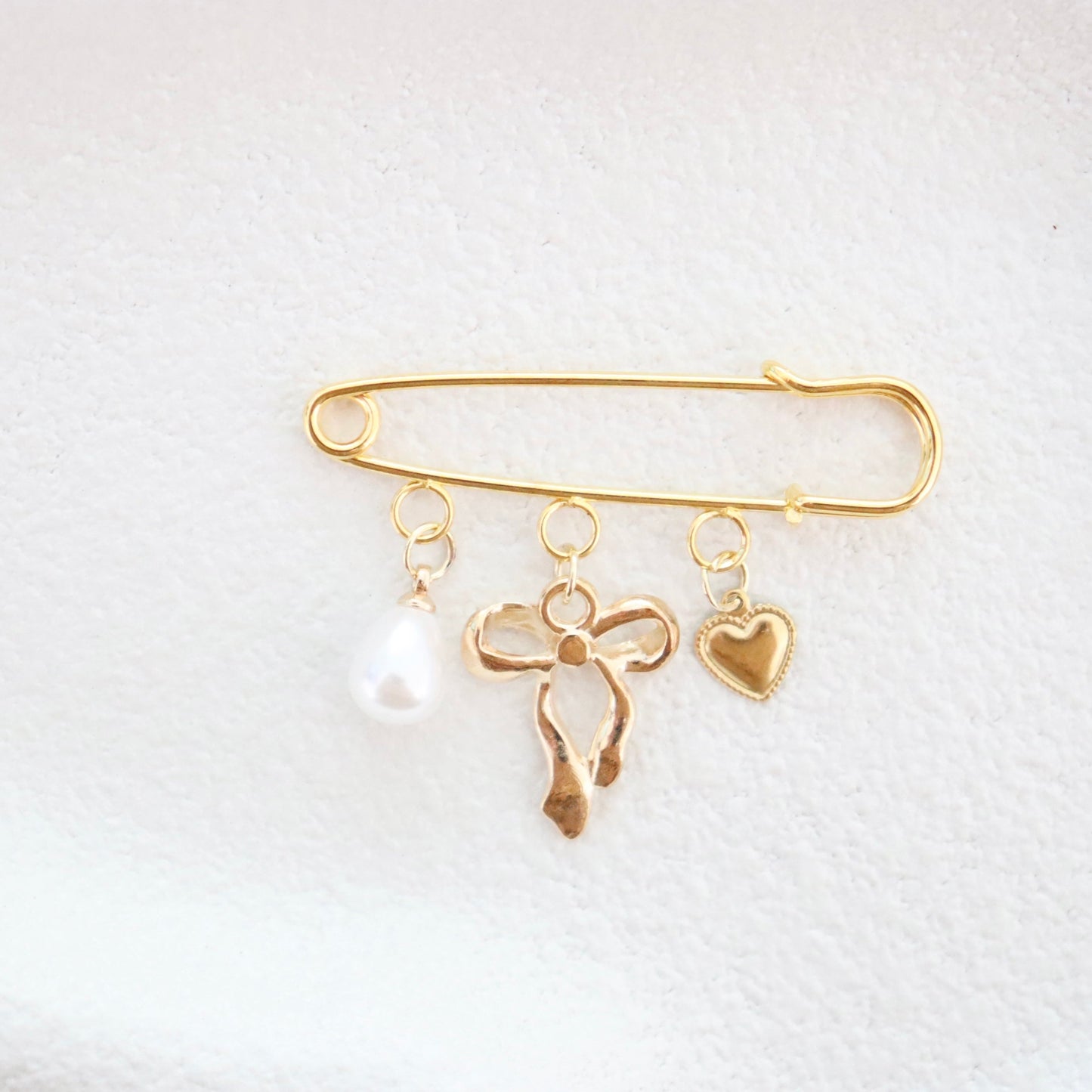 Radiant Bow & Heart Keepsake Pin